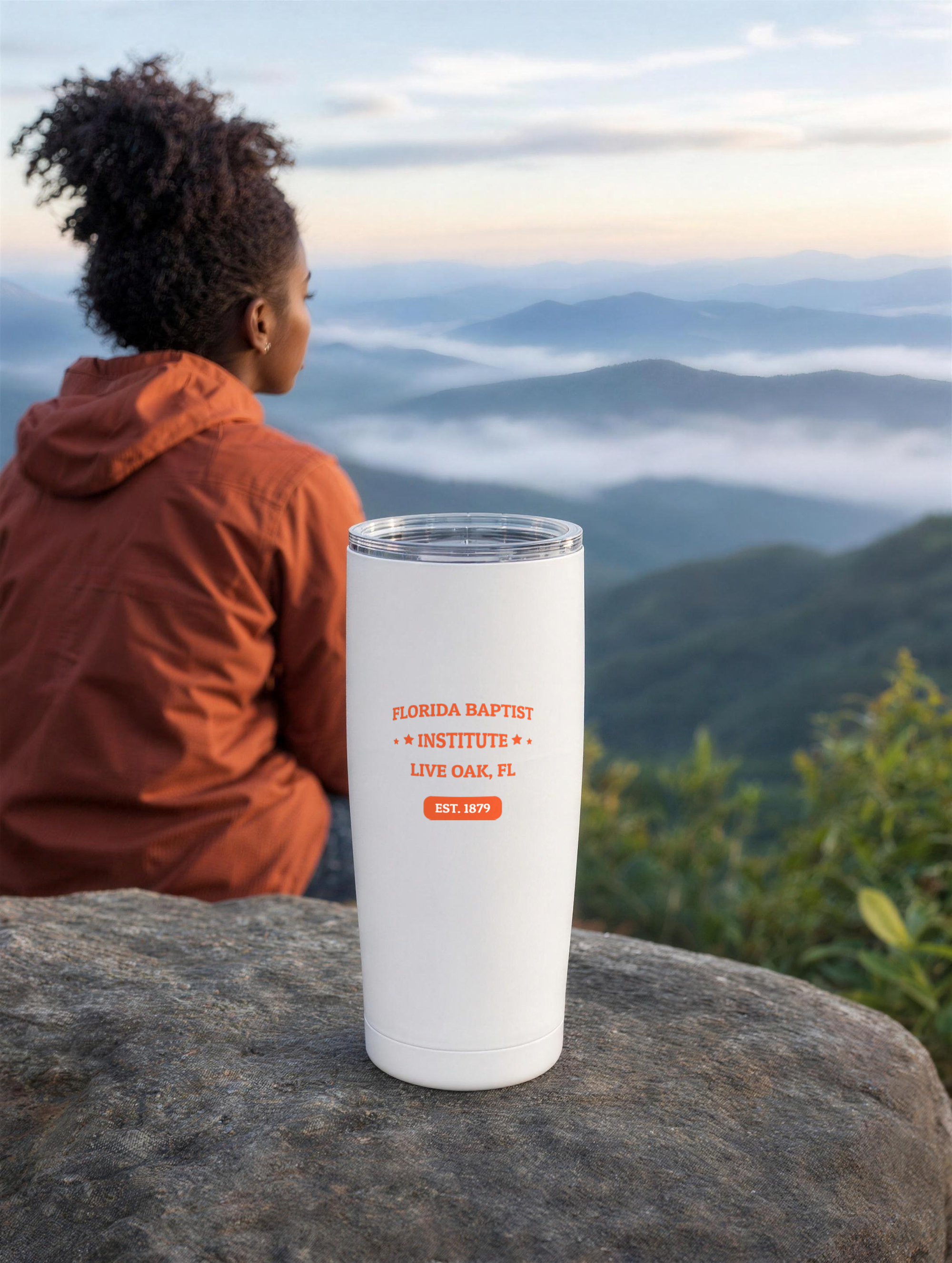 Florida Baptist Institute Heritage Tumbler — Orange Print, in use