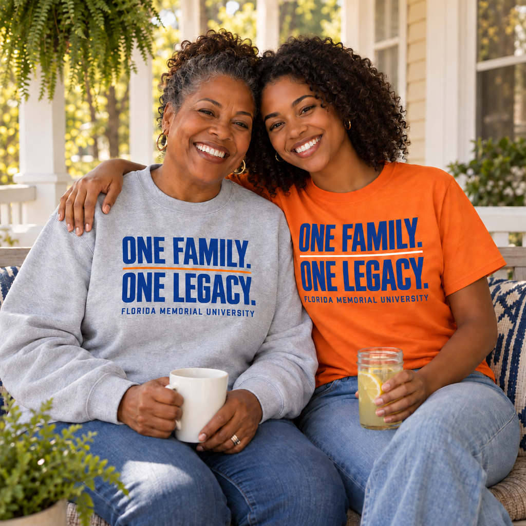 Florida Memorial University One Family. One Legacy. lifestyle mockup: two women on a porch wearing an orange tee with blue lettering and a white divider, and a gray sweatshirt with blue lettering and an orange divider, both shown from the front.