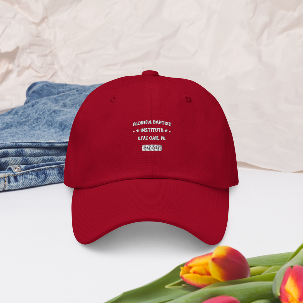 Florida Baptist Institute Heritage Dad Hat, front view on cranberry