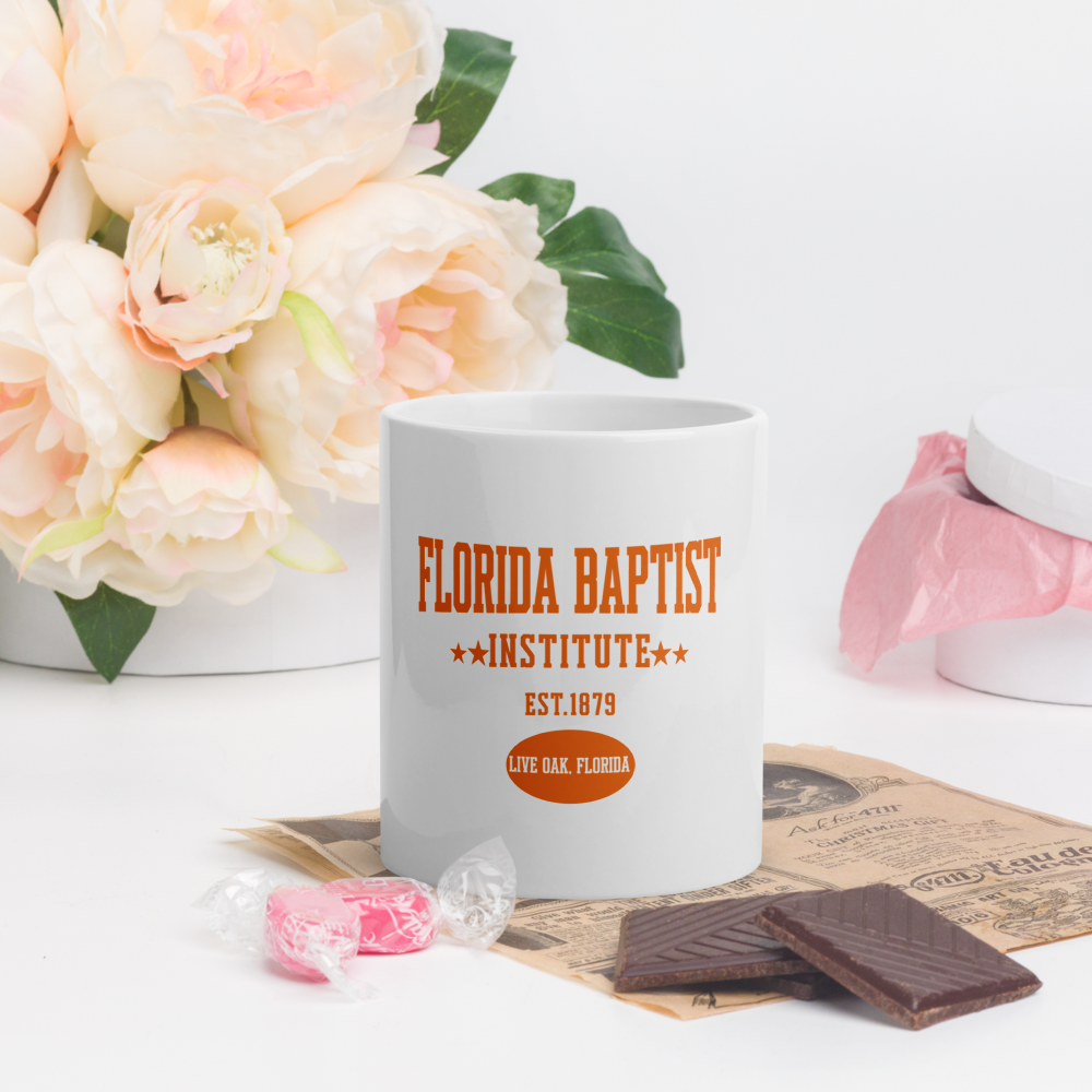 Florida Baptist Institute Heritage Mug, orange print, front view logo centered