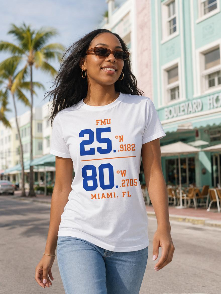 Model in white FMU Coordinates t-shirt, royal blue print, on Ocean Drive Miami
