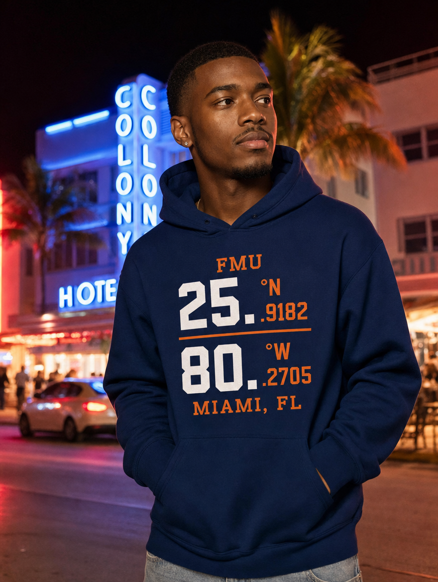 Model in navy FMU Coordinates hoodie, white print, South Beach at night