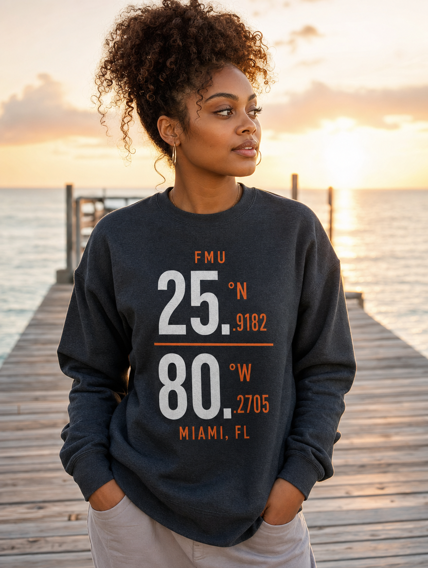 Model in dark heather FMU Coordinates sweatshirt, white print, Miami pier at sunrise
