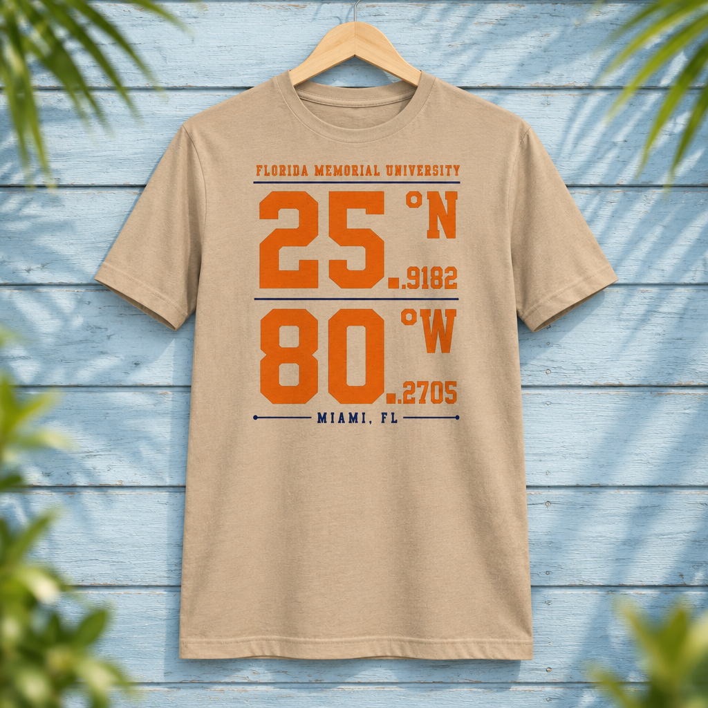 Florida Memorial University Coordinates Tan t-shirt with orange and navy campus-coordinate artwork, displayed front-facing on a hanger against pale-blue clapboard; creative mockup.