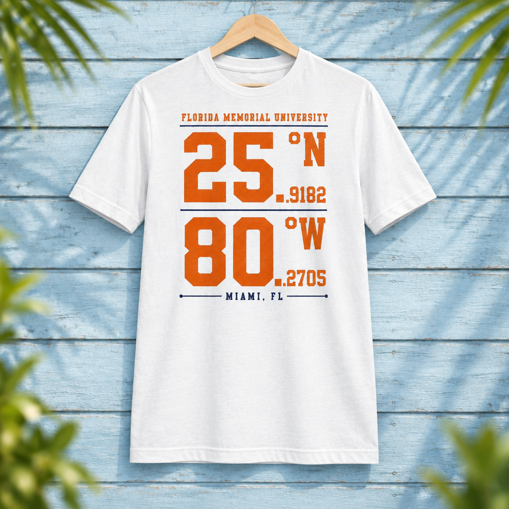 Florida Memorial University Coordinates White t-shirt with orange and navy campus-coordinate artwork, displayed front-facing on a hanger against pale-blue clapboard; creative mockup.