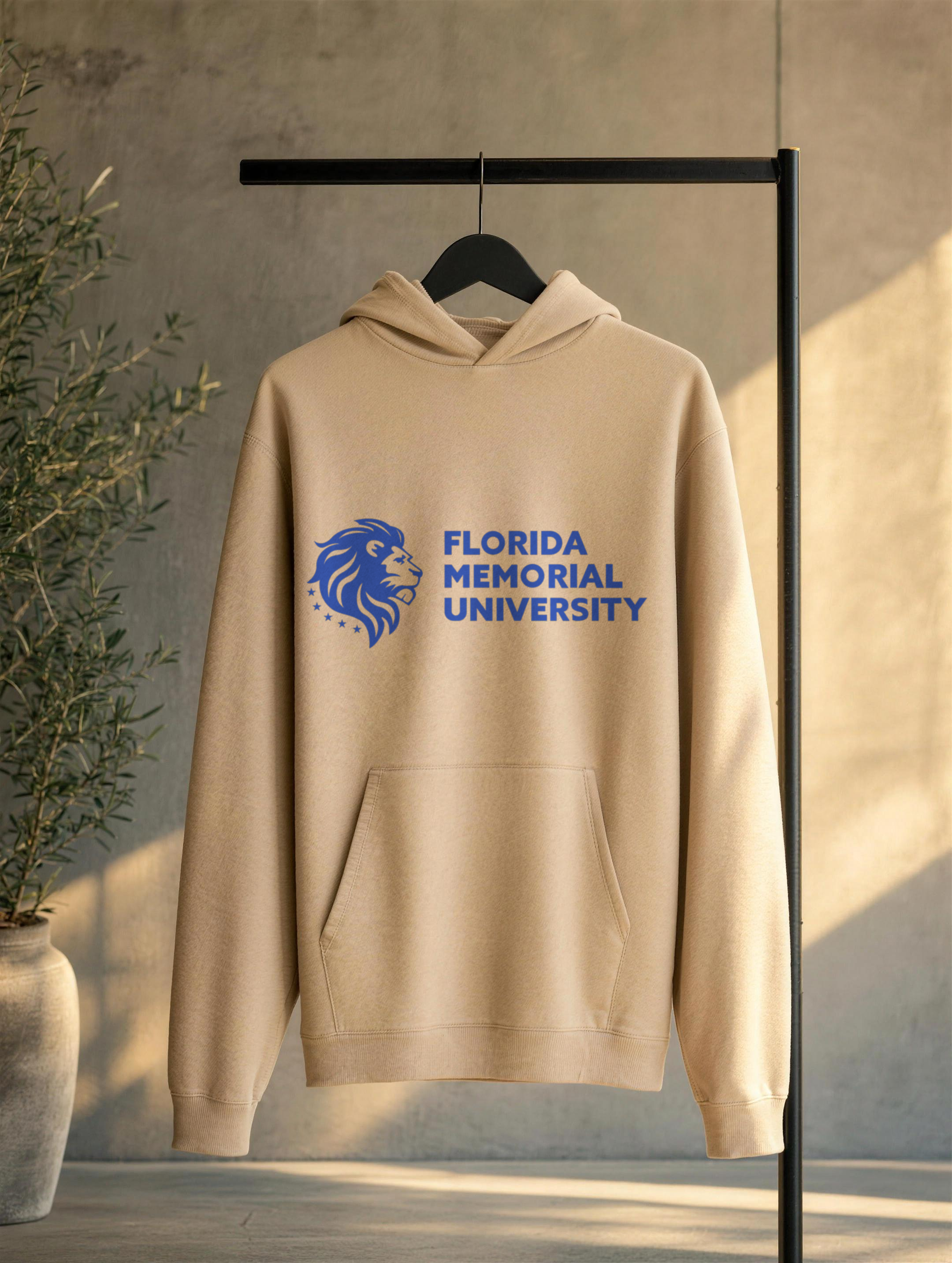Florida Memorial University Stacked Wordmark hoodie in sand on a black metal rack against grey concrete