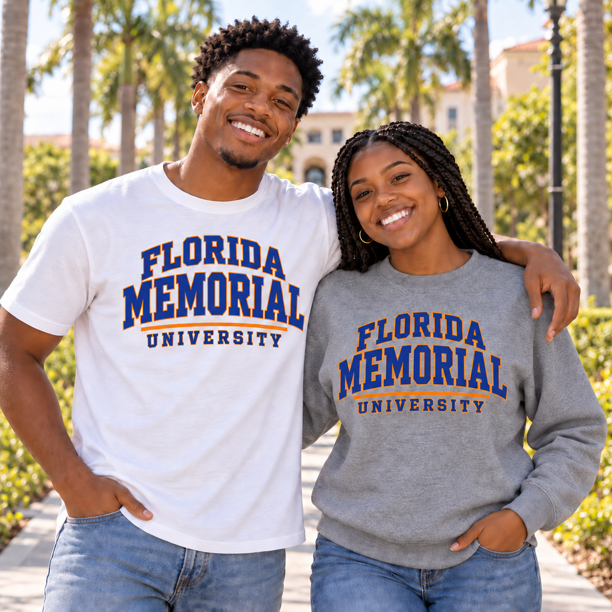 Florida Memorial University Varsity Essentials lifestyle mockup: two adults on a sunny campus walkway wearing a white tee and gray sweatshirt with blue-and-orange collegiate lettering, both shown from the front.